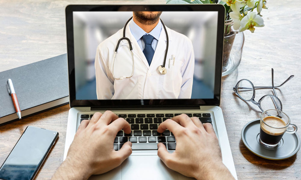 telemedicine physician meeting with patient through computer screen